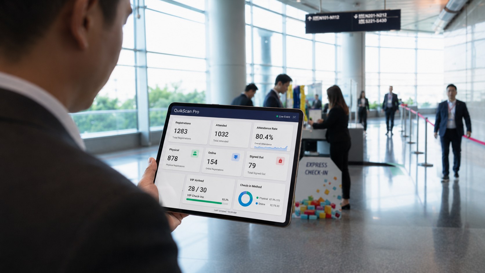 Event insight dashboard on an iPad showing live registration and attendance metrics